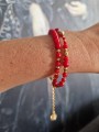 Podwójna bransoletka z czerwonych korali i złotych kulek hematytów