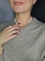 Biały naszyjnik z białego koralu i złotych hematytów